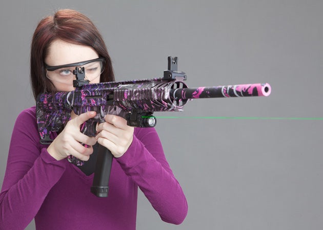 Light and handy, JRC quickly became a range favorite of teenage girls. X5L laser makes it even handier for house-clearing. Note that the laser trail doesn't become visible until the first shot fills the air with fine particles.