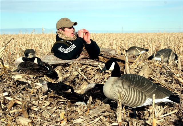 Tyson Keller works distant geese from an Avery field blind near Pierre, South Dakota.