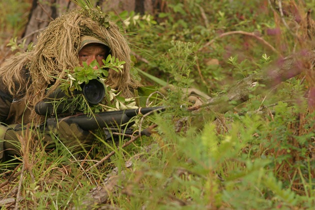 Camouflage is important. Since camo outfits stand out in most social settings, farmer's coveralls are often less noticeable than Muilticam. And, conversely, in the woods, good quality camo fabric that doesn't glow on night vision scopes can be a lifesaver.