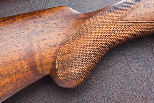 Checkered hardwood stock with half pistol grip