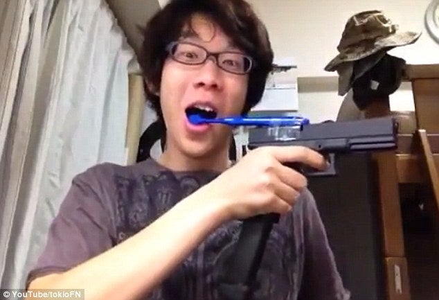 Boy Brushes Teeth with his Airsoft Gun