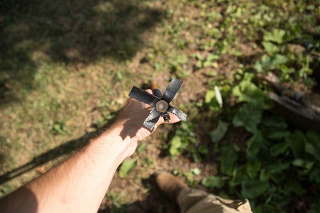 The top rib kept the top from deforming too badly, but the steel opened like flower petals in other directions.