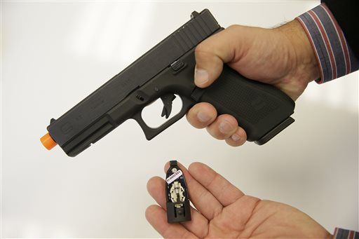 Glock training pistol with Yardcarm Sensor