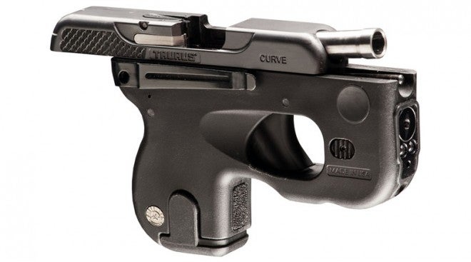 Taurus Curve pistol with the slide open.