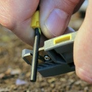 The fire starter uses a magnesium rod and the knife sharpener.