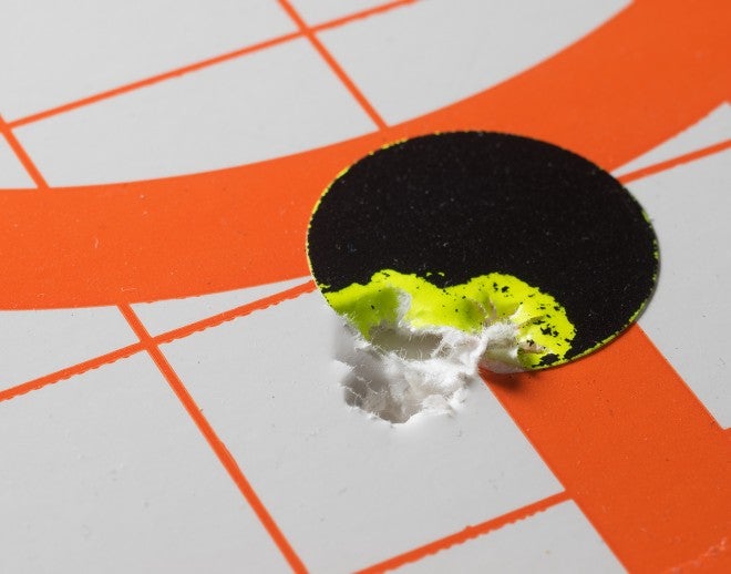 7/16" på 25 yards fungerar till 1,75 MOA-ganska bra för järn sevärdheter och bulk .22 ammunition (CCI Auto).