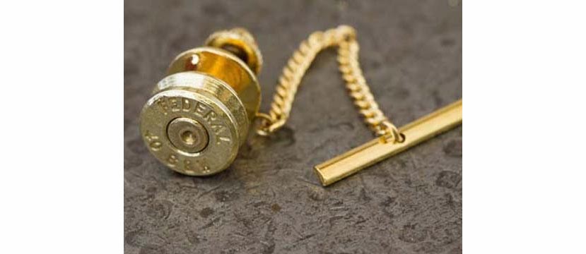 Case head tie tack, choose from 10 different cartridges in brass or nickel. (Photo: Ammo Wear)