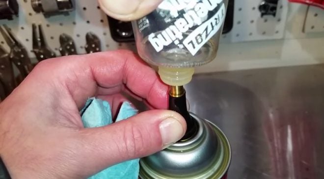 Watch: How to Refill an Aerosol Can With Oil and Pressurize it