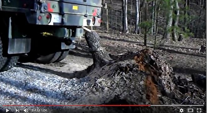 Watch: Pulling a Tree Stump With a 5-Ton Military Truck