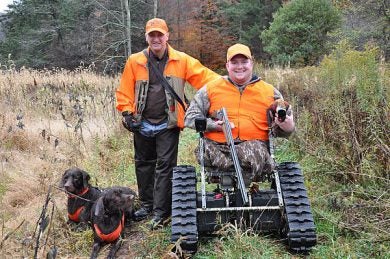 131022-N-ES994-001 OSWAYO, Pa. (Oct. 22, 2013) A Wounded Warrior and a volunteer with the LEEK Hunting and Mountain Preserve pose for a photo during a pheasant hunt in Oswayo, Pa. LEEK was selected to receive the Zachary and Elizabeth Fisher Distinguished Civilian Humanitarian Award for 2012. LEEK Hunting and Mountain Preserve has provided outdoor hunting, fishing and recreational experiences for disabled veterans for more than five years. (U.S. Navy photo by Cmdr. Steven MacDonald/Released)