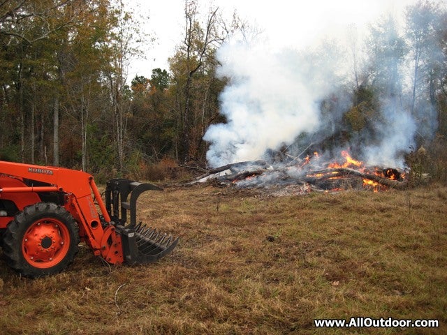 Tractor grapple attachment