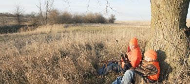 JJ Coles and her son, Trevor, of Nebraska City hunt deer on private land in Nemaha County. Fowler, November 16, 2011. Copyright NEBRASKAland Magazine, Nebraska Game and Parks Commission.