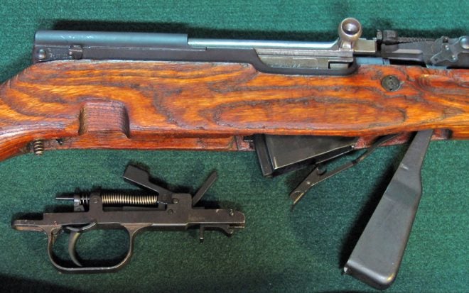 SKS trigger group out, magazine open. (Photo © Russ Chastain)