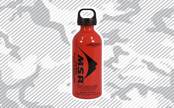 MSR Fuel bottle on urban camo background