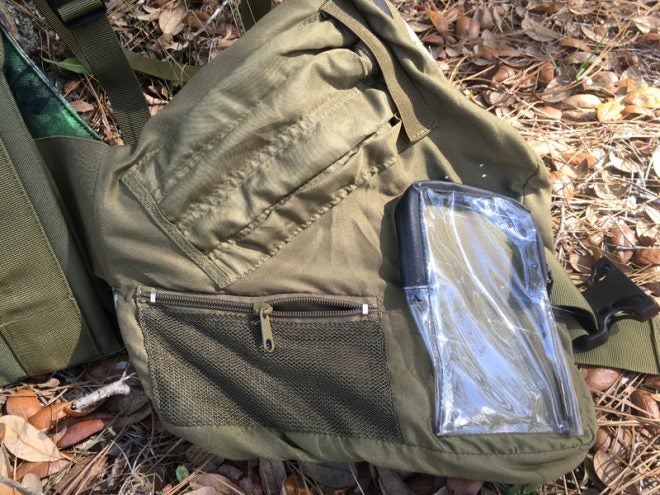 Inside left. Striker pockets, mesh pocket, waterproof phone pocket. (Photo © Russ Chastain)