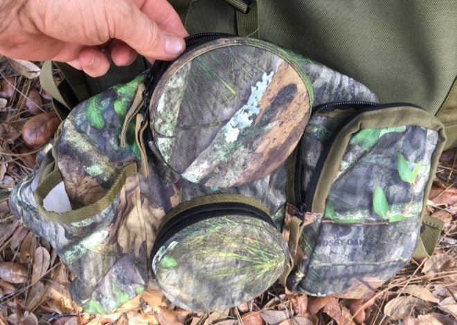 Right side has vertical box call pocket (deeper than it appears here), two molded pot call pockets, and an open-top pocket. (Photo © Russ Chastain)