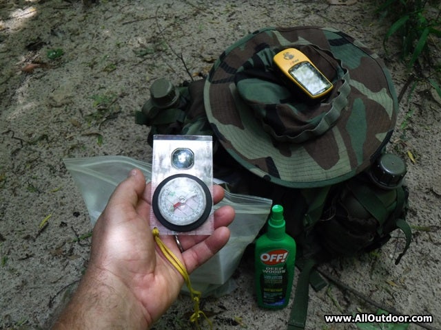 Compass, backpack, boonie hat and GPS