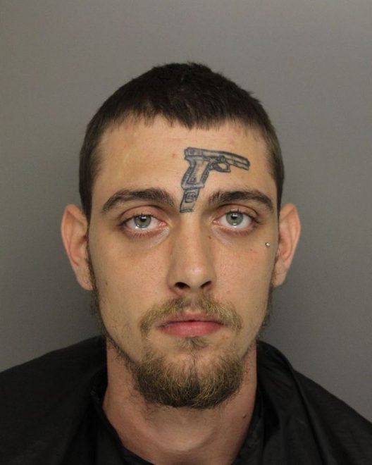 Guy With Gun Tattoo Charged With Illegal Firearm Possession