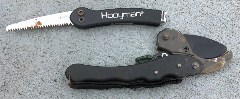 Hooyman Ratchet Pruner with saw open and detached.