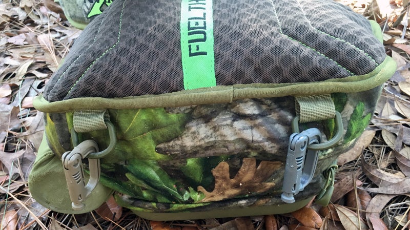 Avian-X Rundown Sling Pack has D-rings on the bottom. I added the clips.