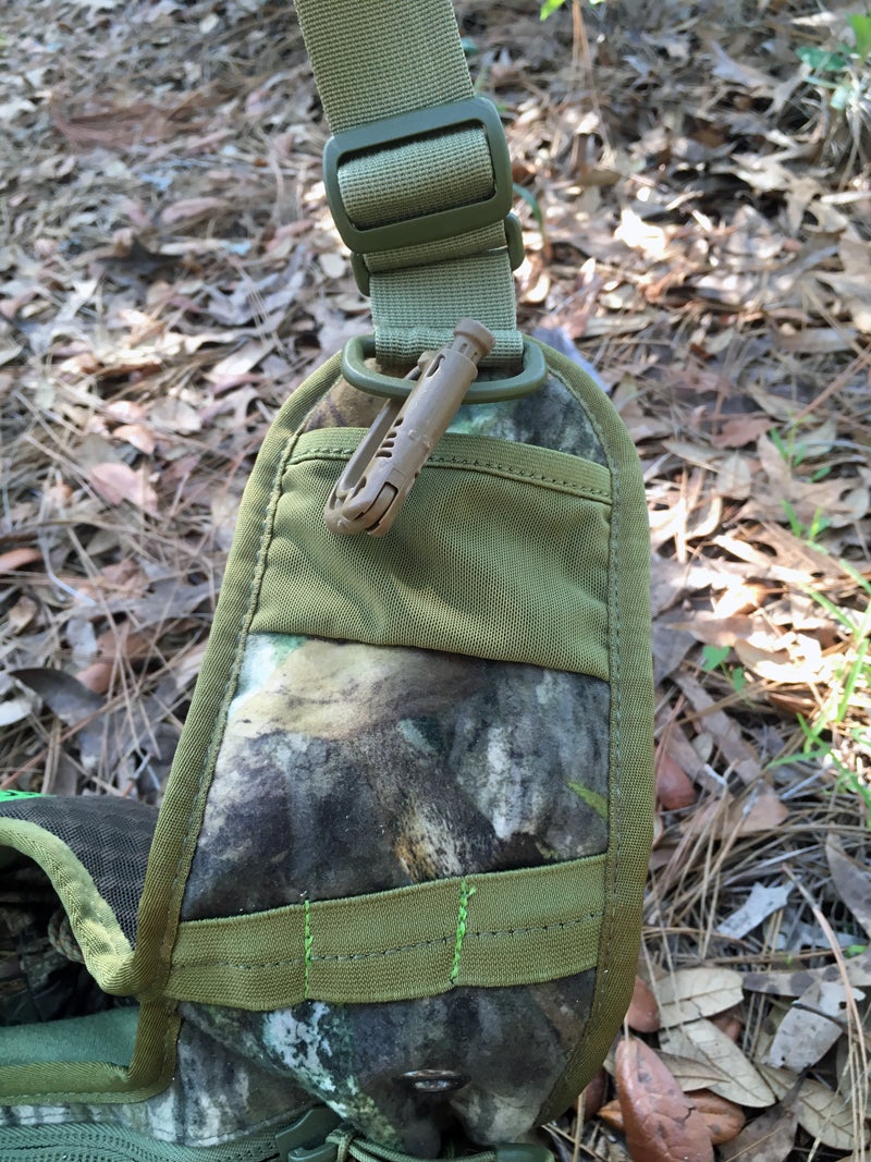 Avian-X Rundown Sling Pack strap pockets. Don't trust the mesh pockets! I added the brown carabiner clip.