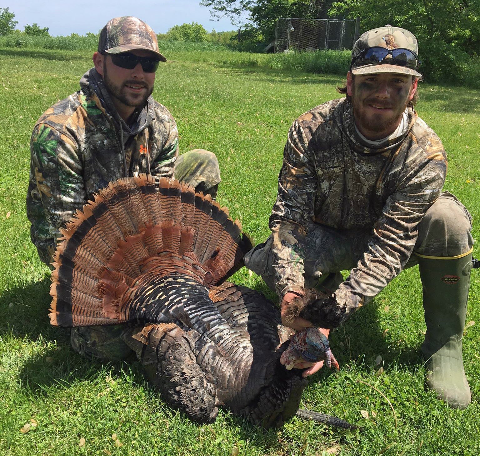 Colby and Hunter with Colby's highly unusual gobbler.