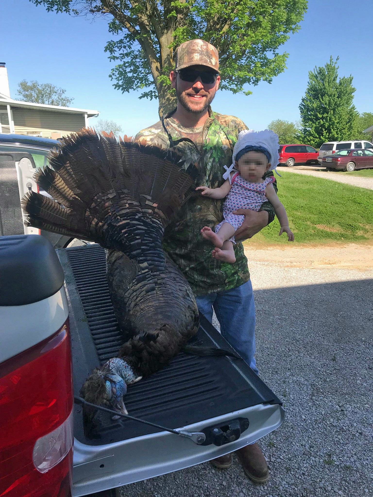 A very happy hunter with a really unusual turkey.