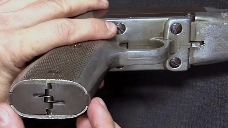 Defiance 20 gauge shotgun pistol has grip storage for spare ammo.
