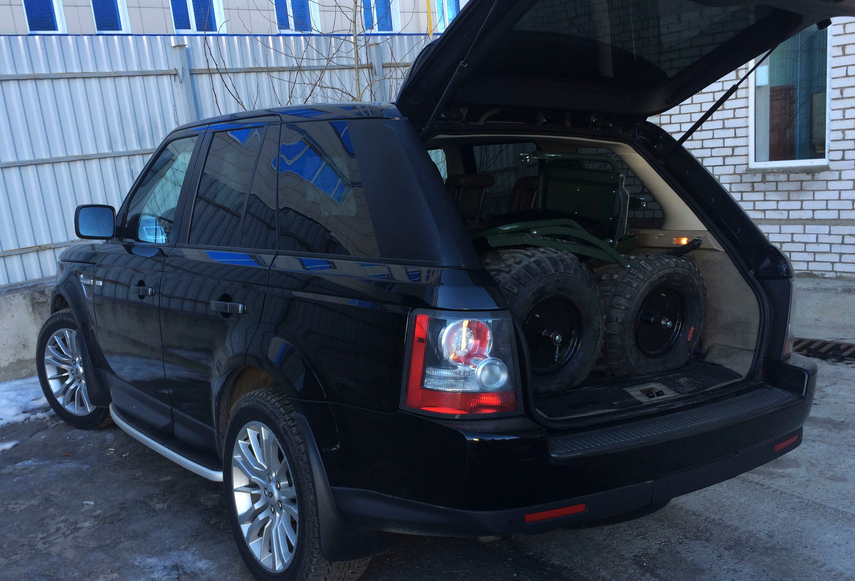 Tarus motorcycle disassembled and stowed in a vehicle for transport.