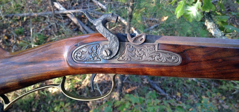 An old-fashioned traditional muzzleloader has the cap exposed to the elements. (Photo © Russ Chastain)