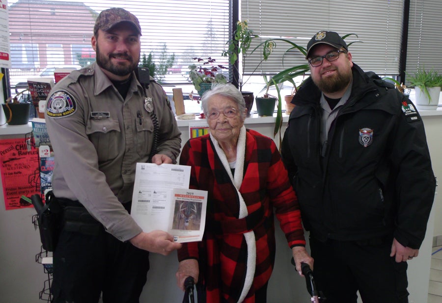 Florence Teeters with her first-ever hunting license. (Image: Bill Ball)