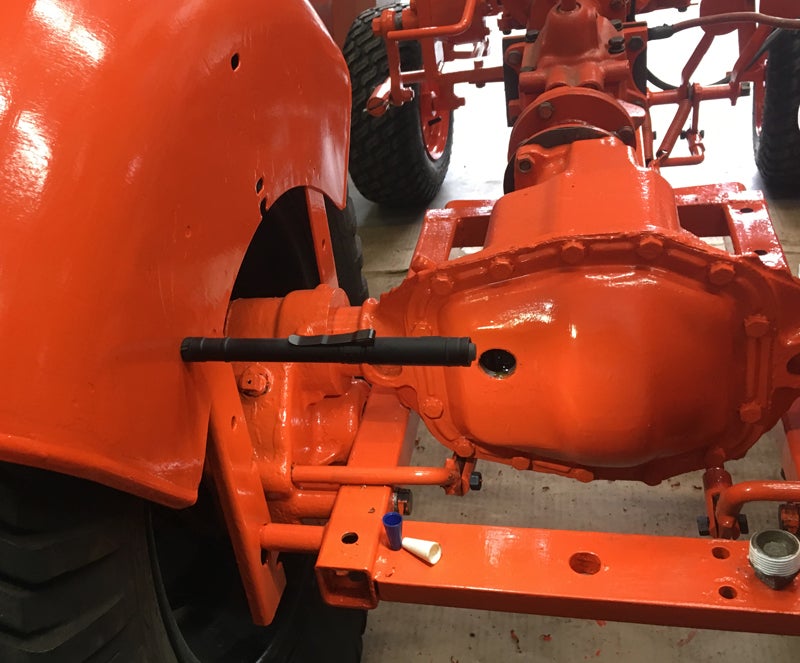 I used the Streamlight Stylus Pro COB in my shop and while hunting. Here, it helped me see the fluid level as I filled this tractor differential. (Photo © Russ Chastain)