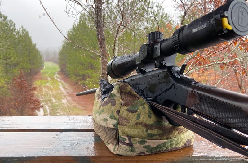 The rifle and scope survived the rain just fine. Flip-up caps sure are handy for keeping the glass dry. (Photo © Russ Chastain)