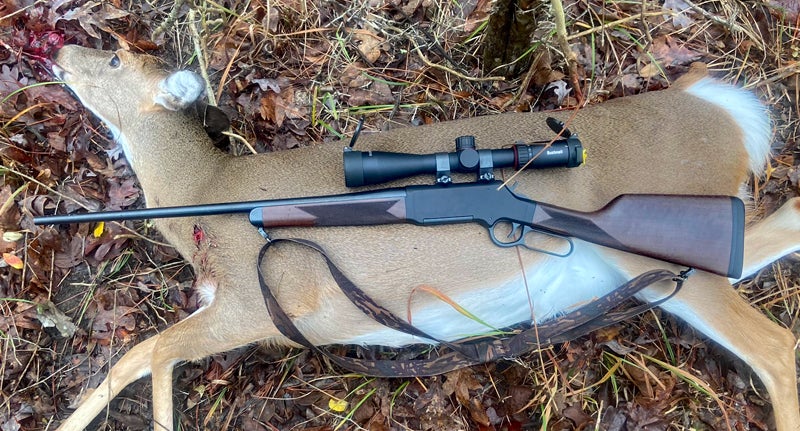 Henry Long Ranger 6.5 Creedmoor with the deer it took. Exit wound is visible. (Photo © Russ Chastain)