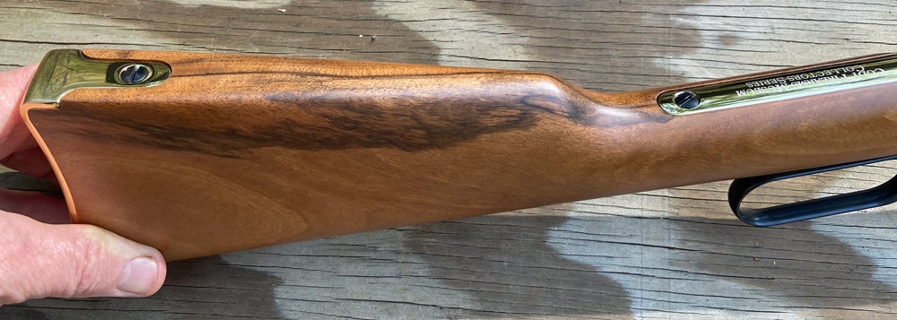 The walnut stock is attractive and tastefully finished. (Photo © Russ Chastain)