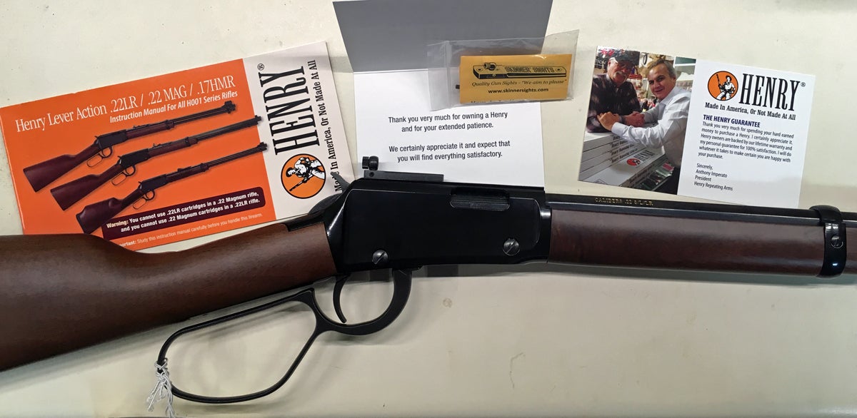 Henry Small Game Rifle with the stuff included in the box. (Photo © Russ Chastain)
