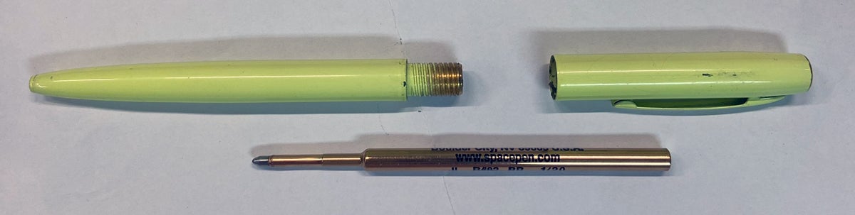 The two parts of the pen body are threaded together, with the pressurized ink cartridge inside. (Photo © Russ Chastain)