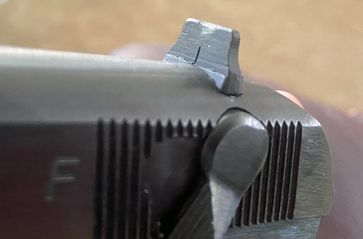 Front of rear sight shows an odd mark or deformation. (Photo © Russ Chastain)