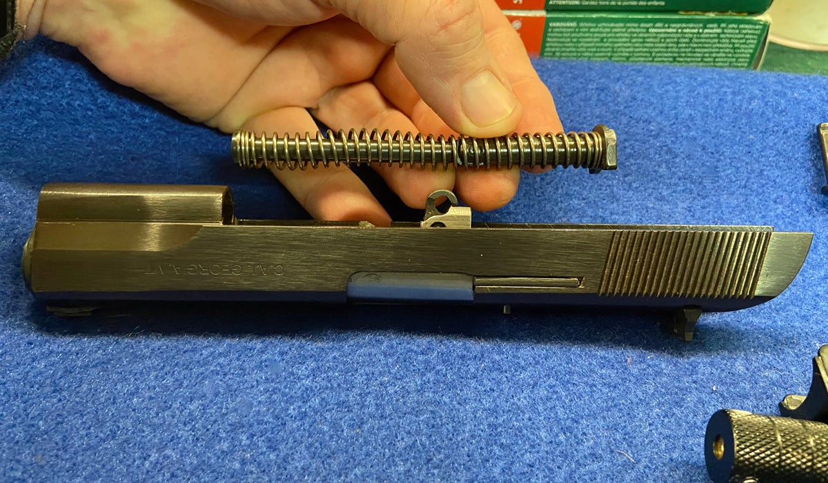 Guide rod & spring removed from Zastava M57 pistol. (Photo © Russ Chastain)