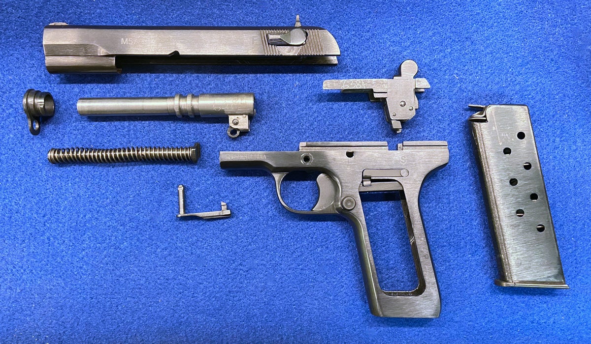 Fully field-stripped Zastava M57 pistol. (Photo © Russ Chastain)