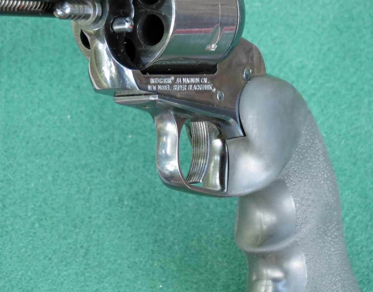 Wide, grooved trigger on a Suger New Model Super Blackhawk 44 magnum revolver. (Photo © Russ Chastain)