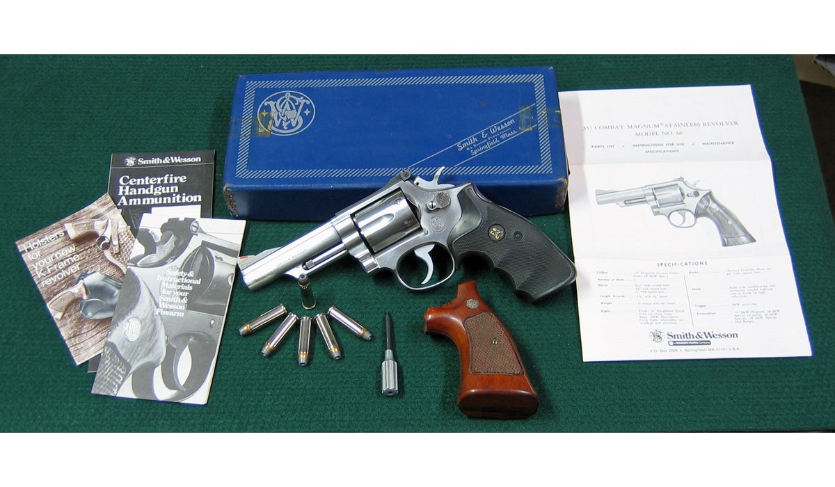 Smith & Wesson Model 66 357 Magnum Stainless Combat Revolver, first engineering change (66-1), with factory original box, paperwork, original grips, screwdriver, and ammo. (Photo © Russ Chastain)