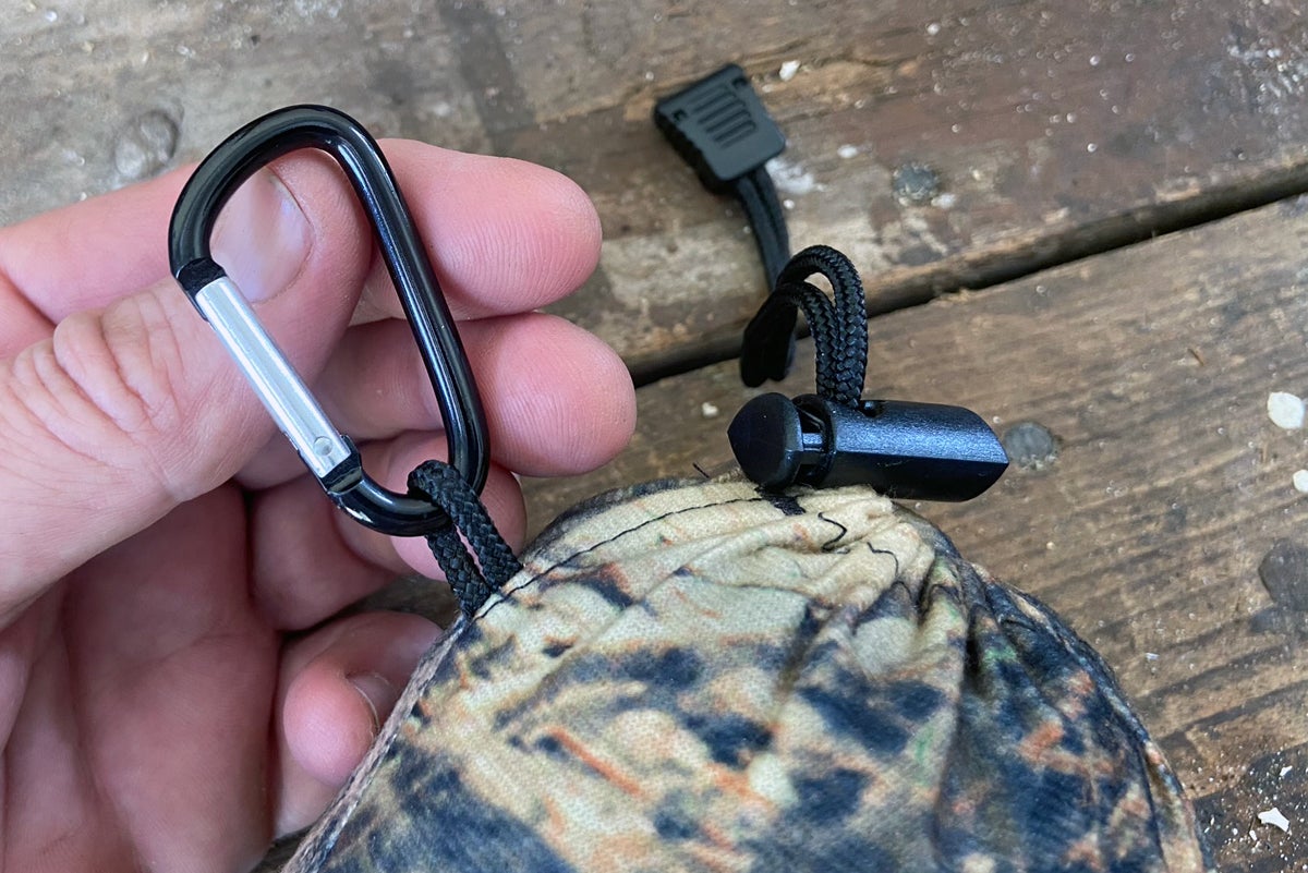 The stuff sack has a locking drawstring and this handy-dandy carabiner clip. (Photo © Russ Chastain)