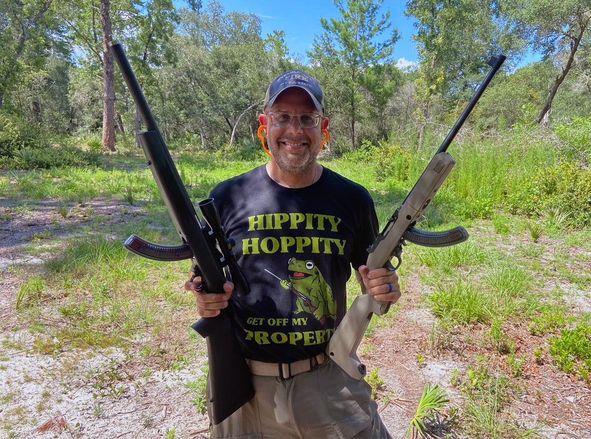 Hank sports a brace of Ruger 10/22s with "Hot Lips" magazines. (Photo © Russ Chastain)