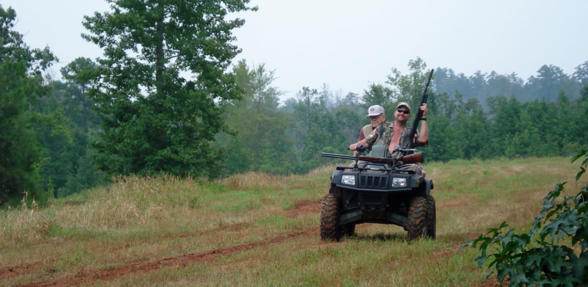 Taking Dad to the truck. Browning in gun rack, Benelli well under control in hand. (Photo © Russ Chastain)