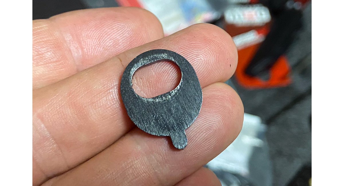 This unmarked washer/key was used on the unshimmed butt stock. (Photo © Russ Chastain)