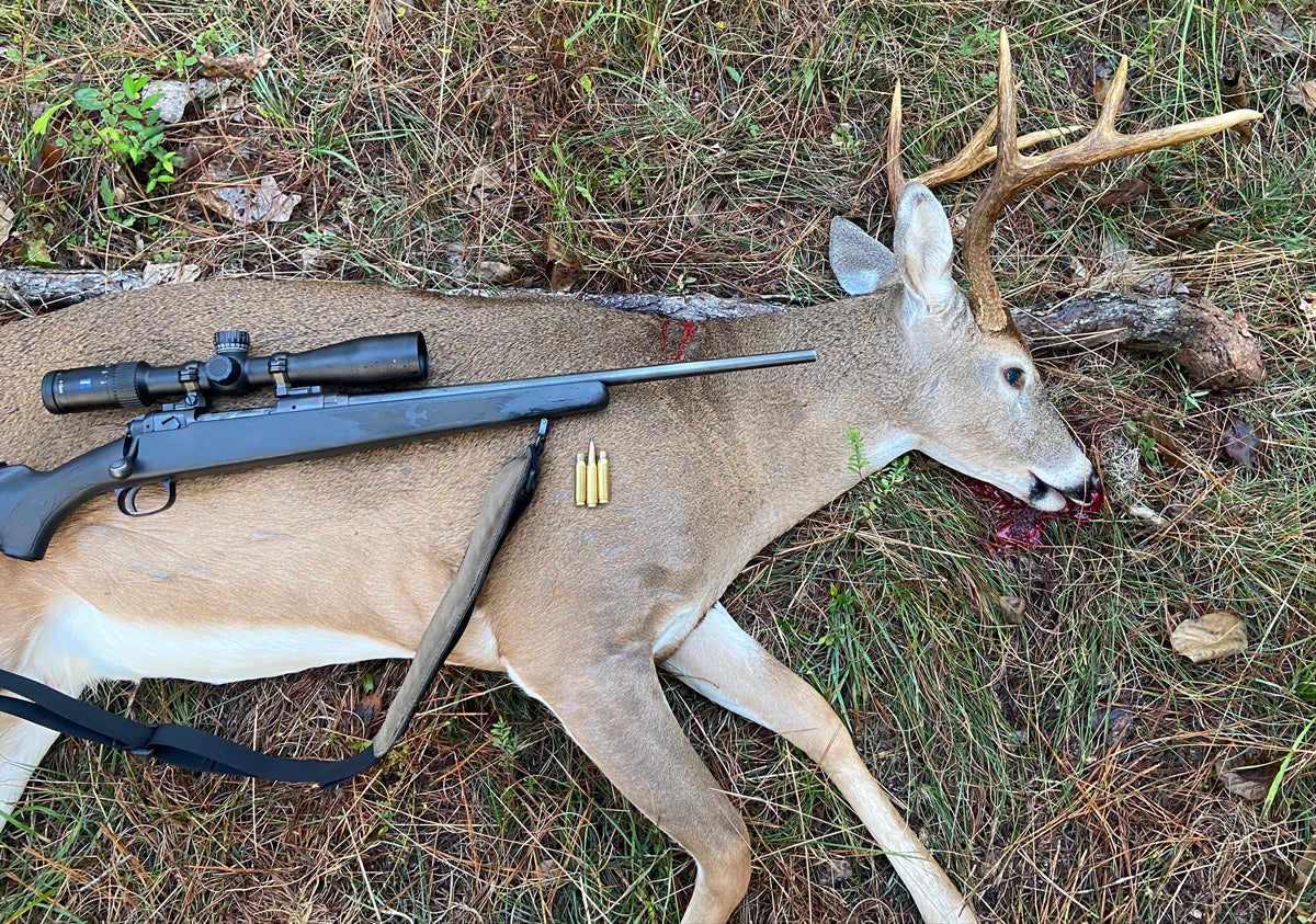My heaviest whitetail buck so far weighed in at 200 pounds. The first hit was a high spine shot. (Photo © Russ Chastain)
