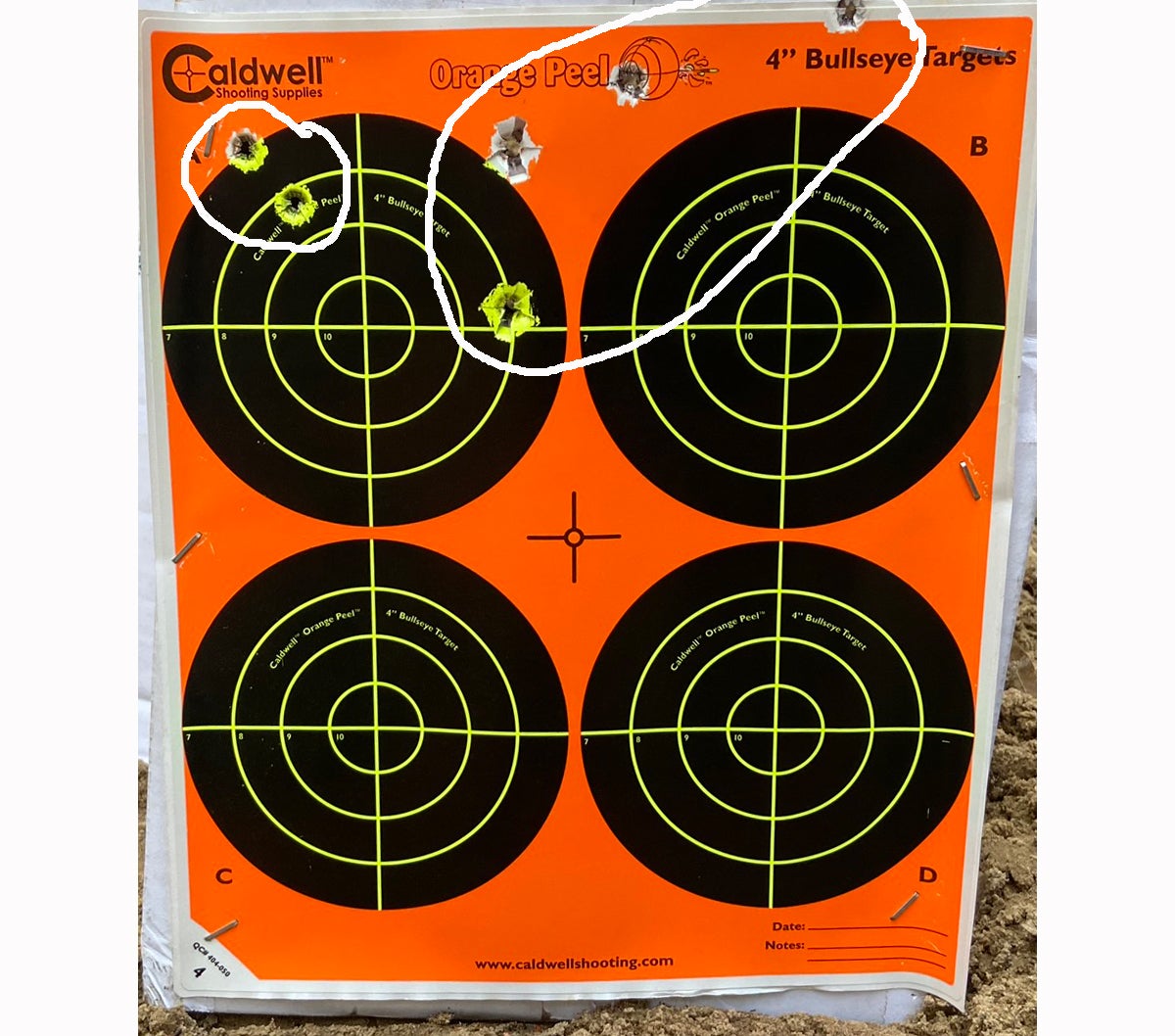 Two groups at 150 yards. The barrel had gotten hot, so it was time to quit. (Photo © Russ Chastain)