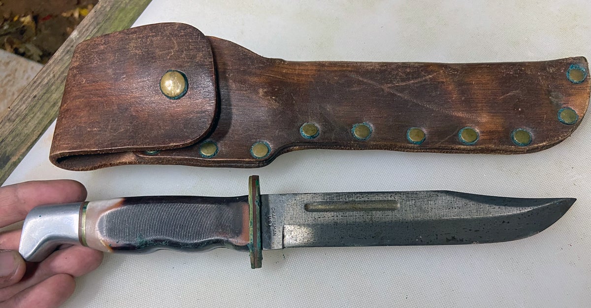 Craftsman Bowie knife with original leather sheath. (Photo © Russ Chastain)