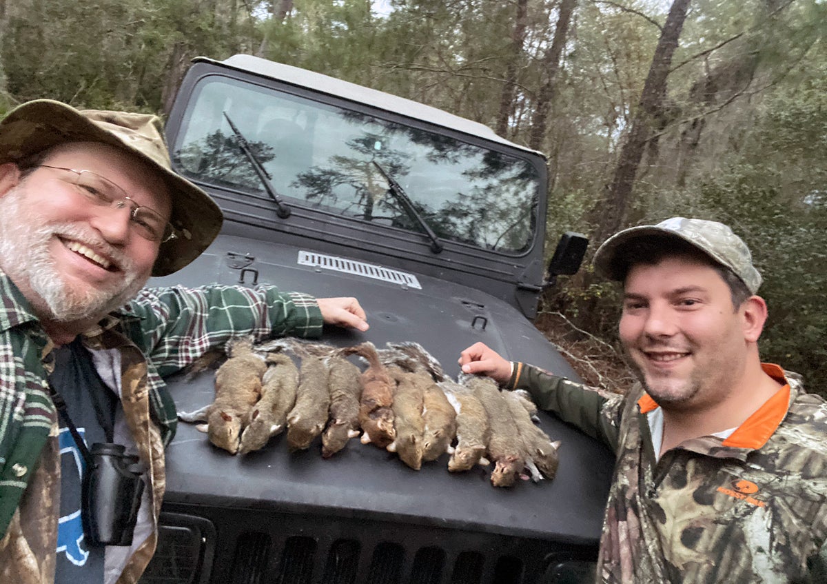 A couple of happy hunters with their quarry. (Photo © Russ Chastain)